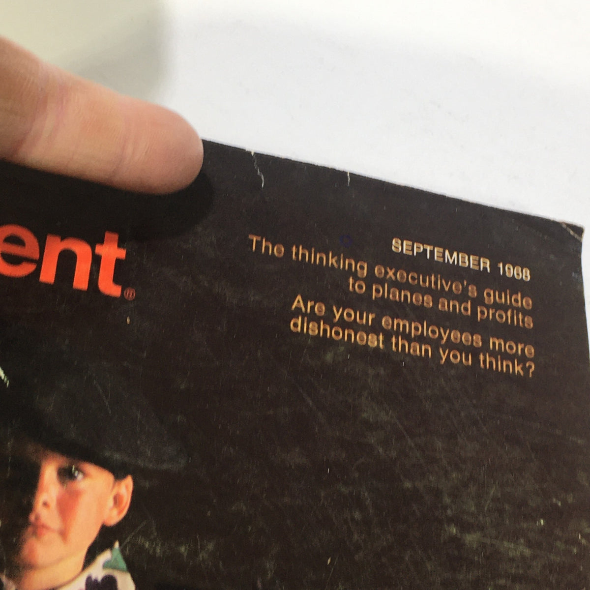 Cover of VTG Business Management Magazine September 1968, featuring text about business strategies and employee honesty, with a child's hand pointing at the title.