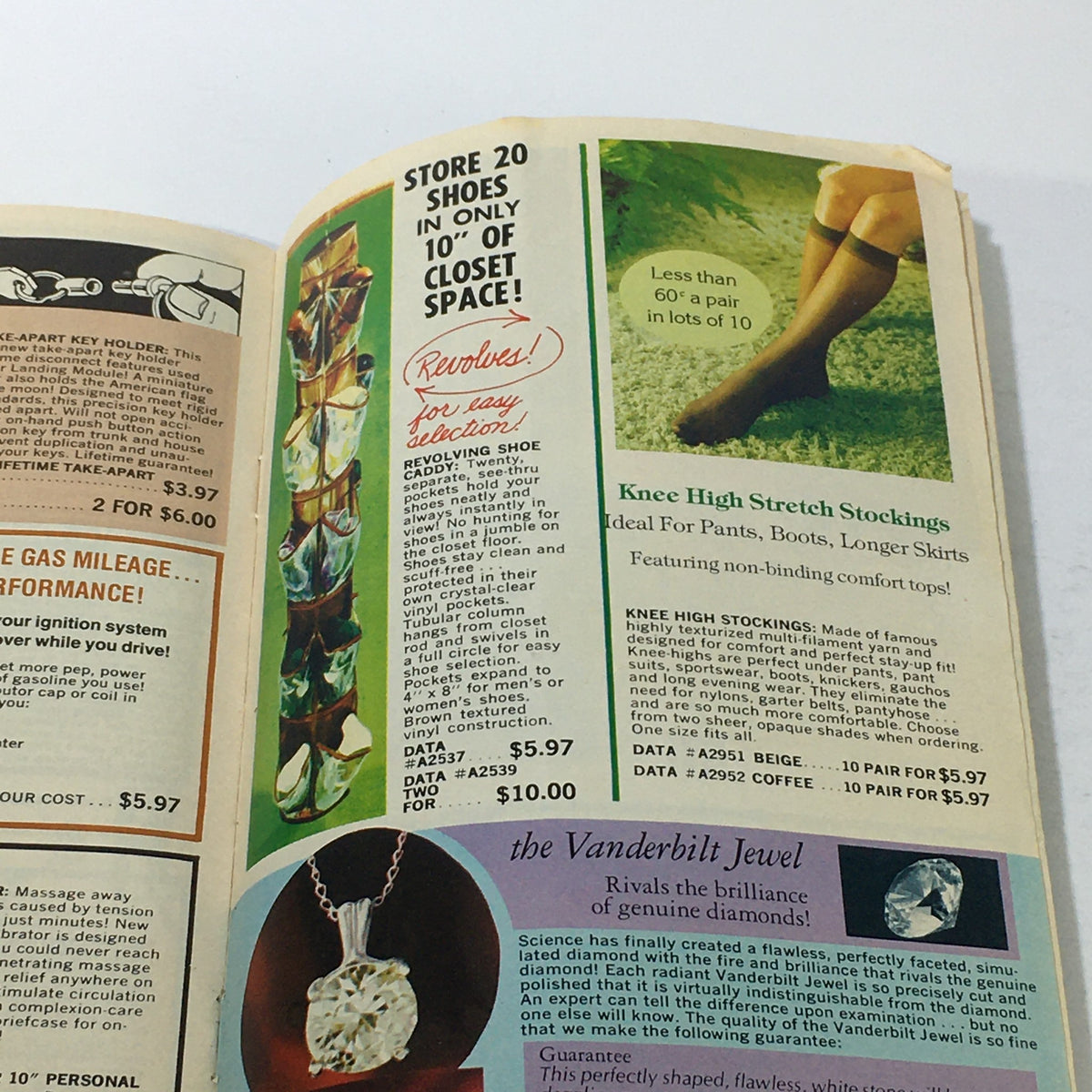Another interior page of the VTG Rare United States Purchasing Exchange Price Guide displaying fashion items and a unique jewelry piece.