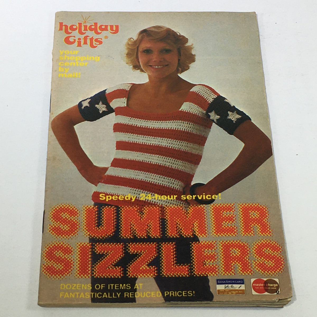 VTG Rare Summer Sizzlers Holiday Gifts Price Guide Catalog cover featuring a woman wearing a star-patterned sweater and a colorful title, showcasing summer-themed products.