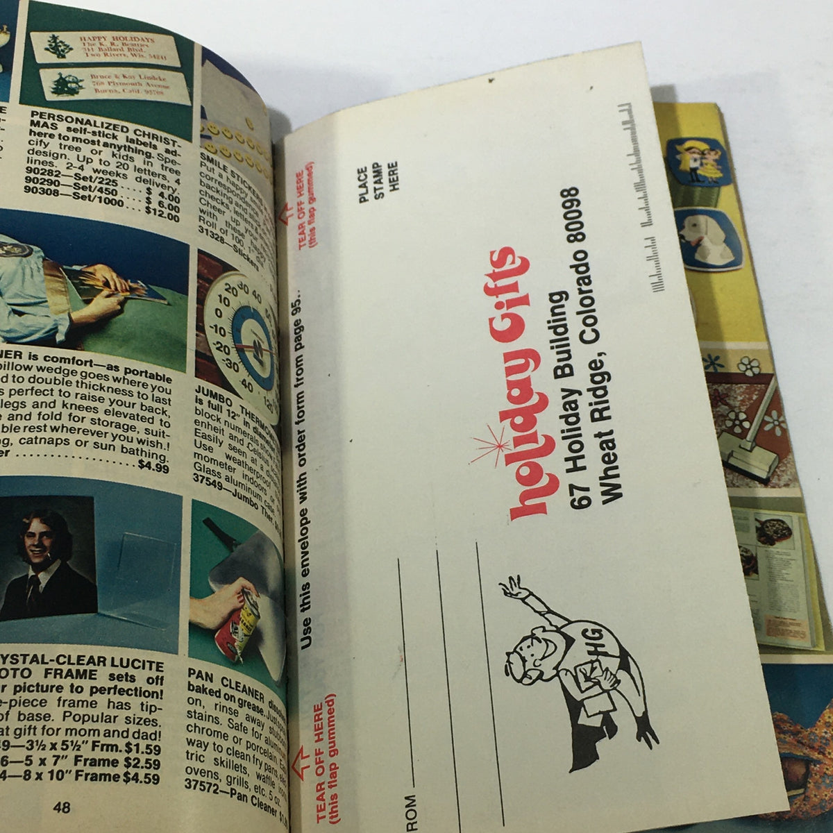 Inside view of the VTG Rare Santa's Helpers Holiday Gifts Price Guide Catalog 1967, showcasing a page with holiday gift listings and decorative details.