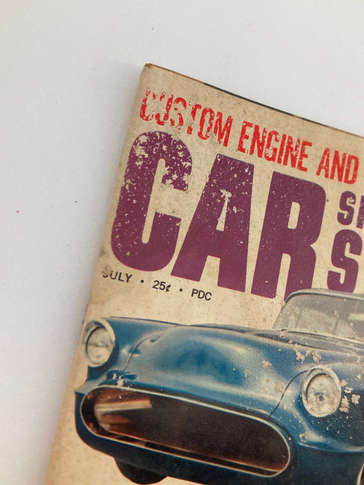 Close-up of the VTG Car Speed & Style Magazine July 1961 Vol 7 #7 cover, highlighting the title and details of a blue custom car, showcasing its vintage charm.