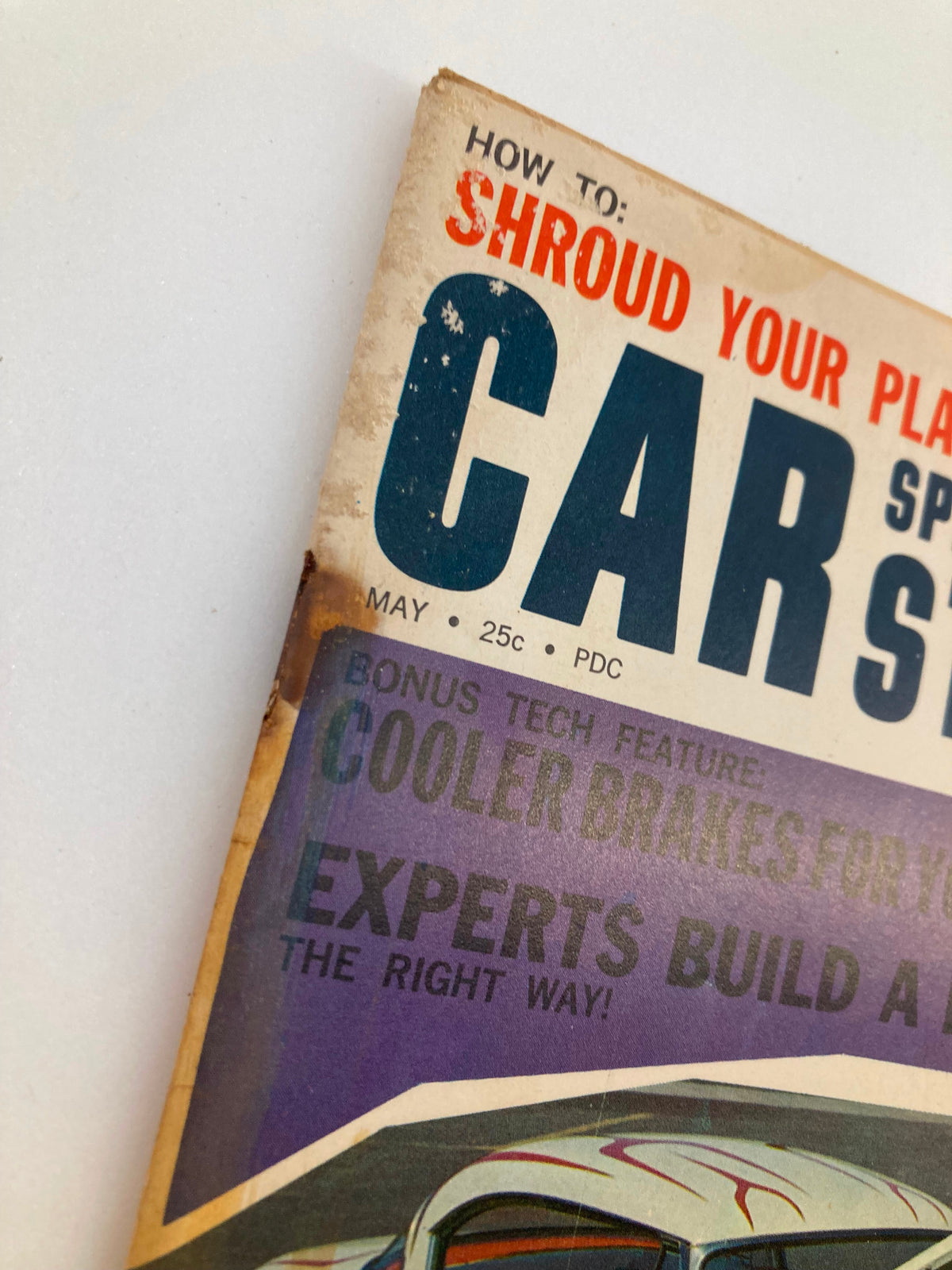 Close-up of the May 1961 VTG Car Speed & Style Magazine cover highlighting automotive tips and features including how to shroud your plates and cooler brake options.
