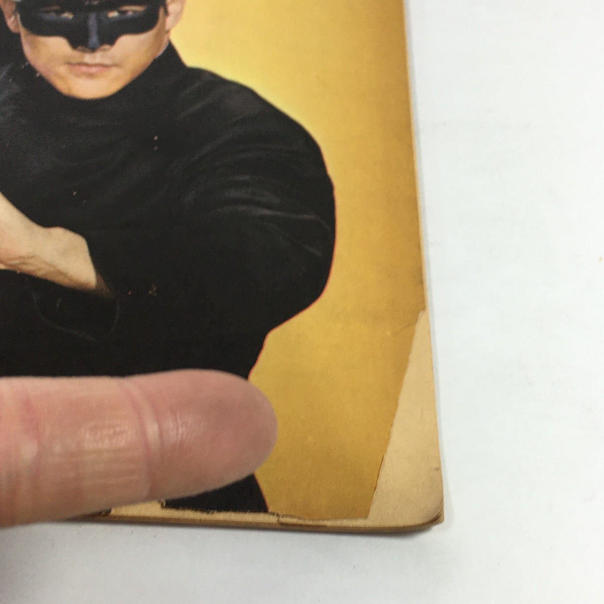Close-up of VTG TV Preview Vol. 1 No. 14 December 11-17 1966 featuring The Green Hornet, highlighting a character in a mask and black attire.
