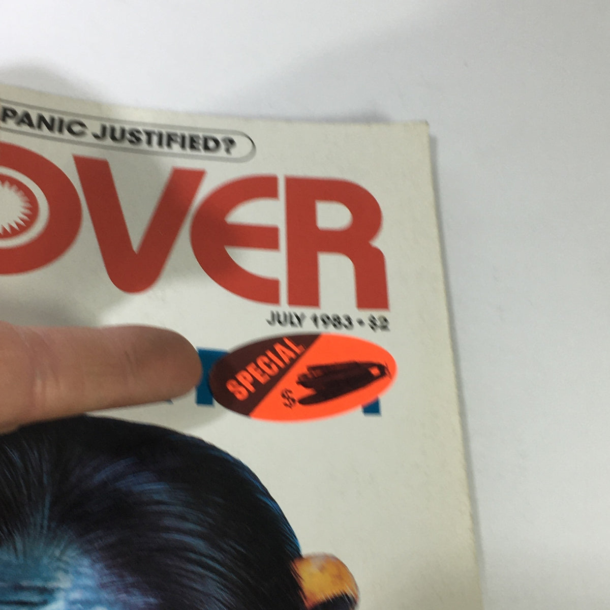Close-up of the title section of VTG Discover Science Magazine July 1983 - The Ape, showcasing the magazine's name and special edition label.