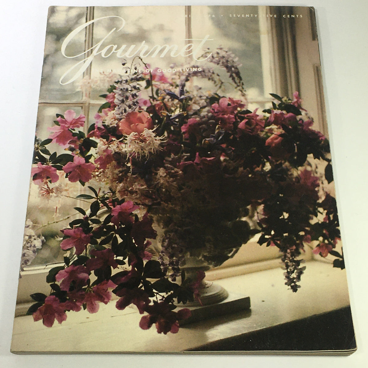 Cover of VTG Gourmet: The Magazine of Good Living, April 1976 edition, featuring a floral arrangement in a vase, showcasing vintage elegance and culinary sophistication.