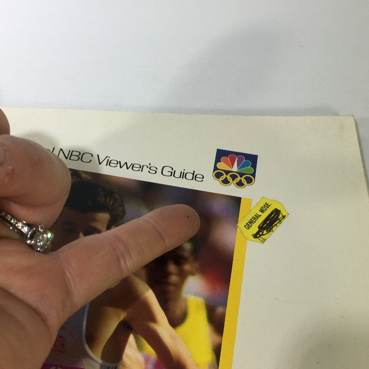 Close-up of the VTG 1988 Olympic Games Official NBC Viewer's Guide showing details like the NBC logo and price sticker.