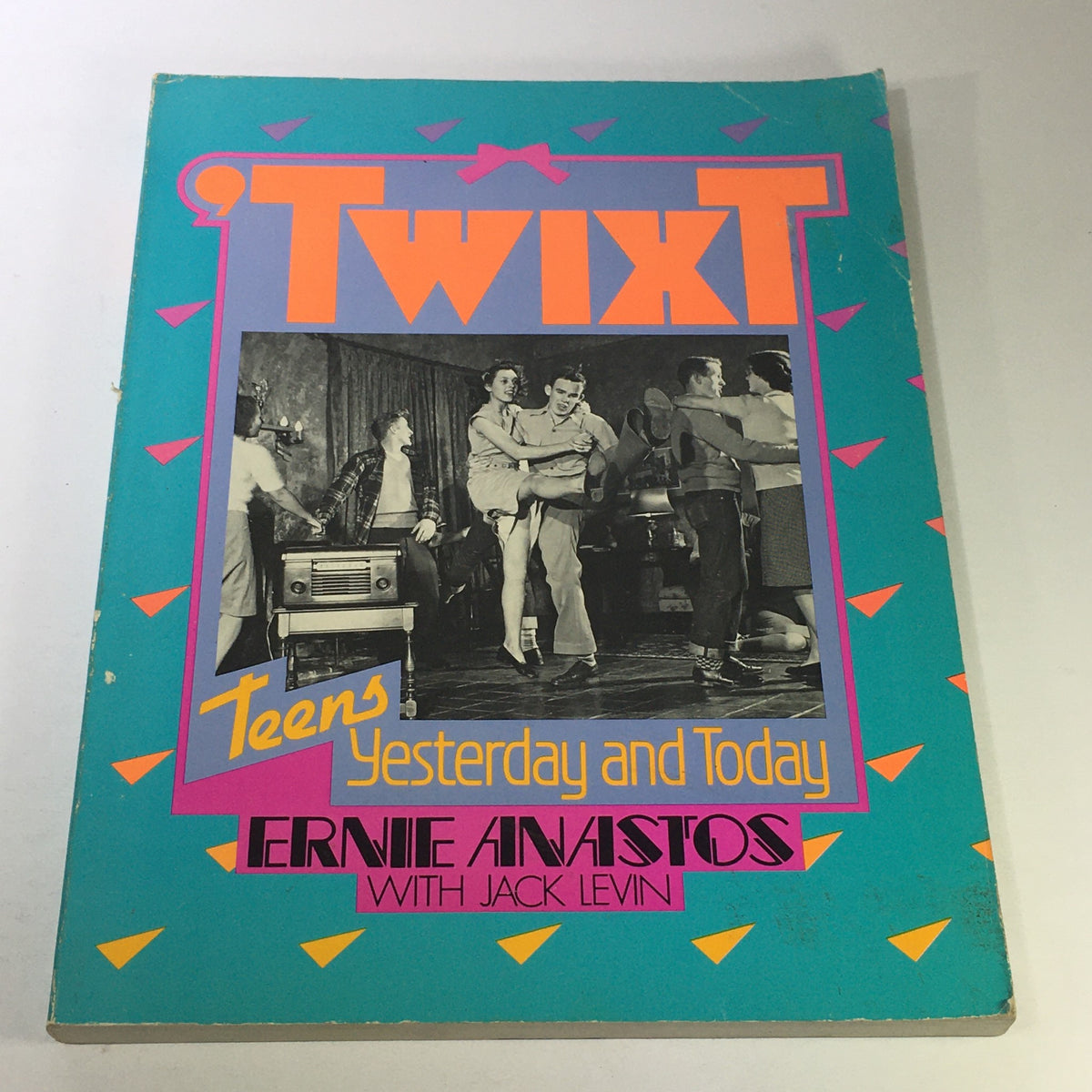 Cover of VTG 1983 TwixT Teens Yesterday and Today magazine featuring Ernie Anastos and Jackie Levin with a colorful design and retro vibes.