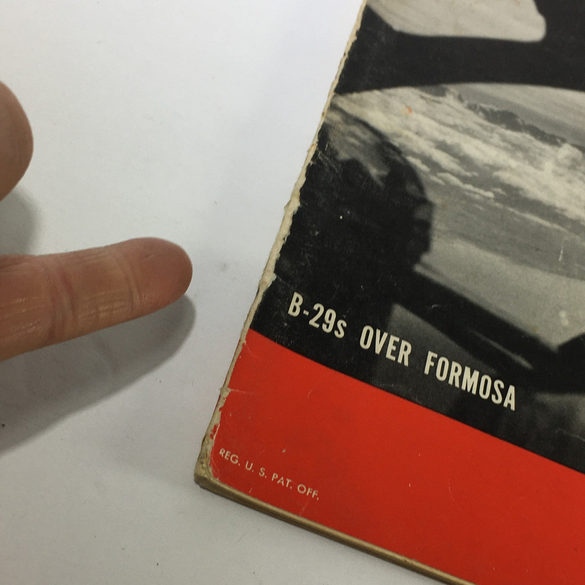 Close-up of the spine of VTG Life Magazine December 4 1944, highlighting the title B-29s Over Formosa and showing signs of vintage wear.
