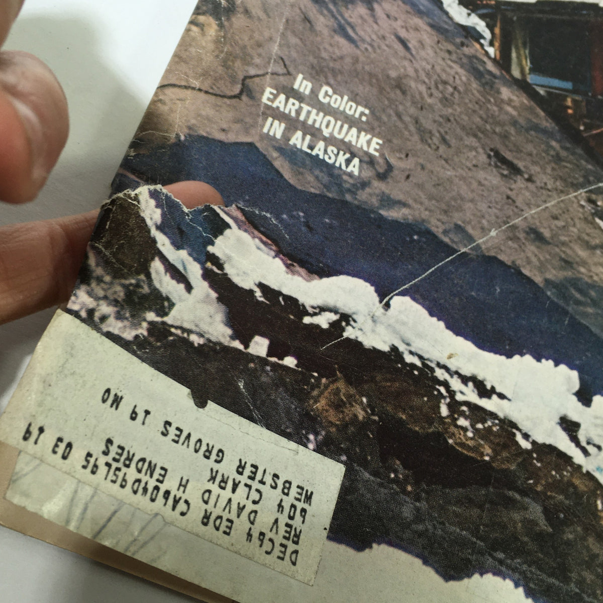 Detail of the damaged corner on the cover of VTG Life Magazine April 10 1964, highlighting the Earthquake in Alaska.