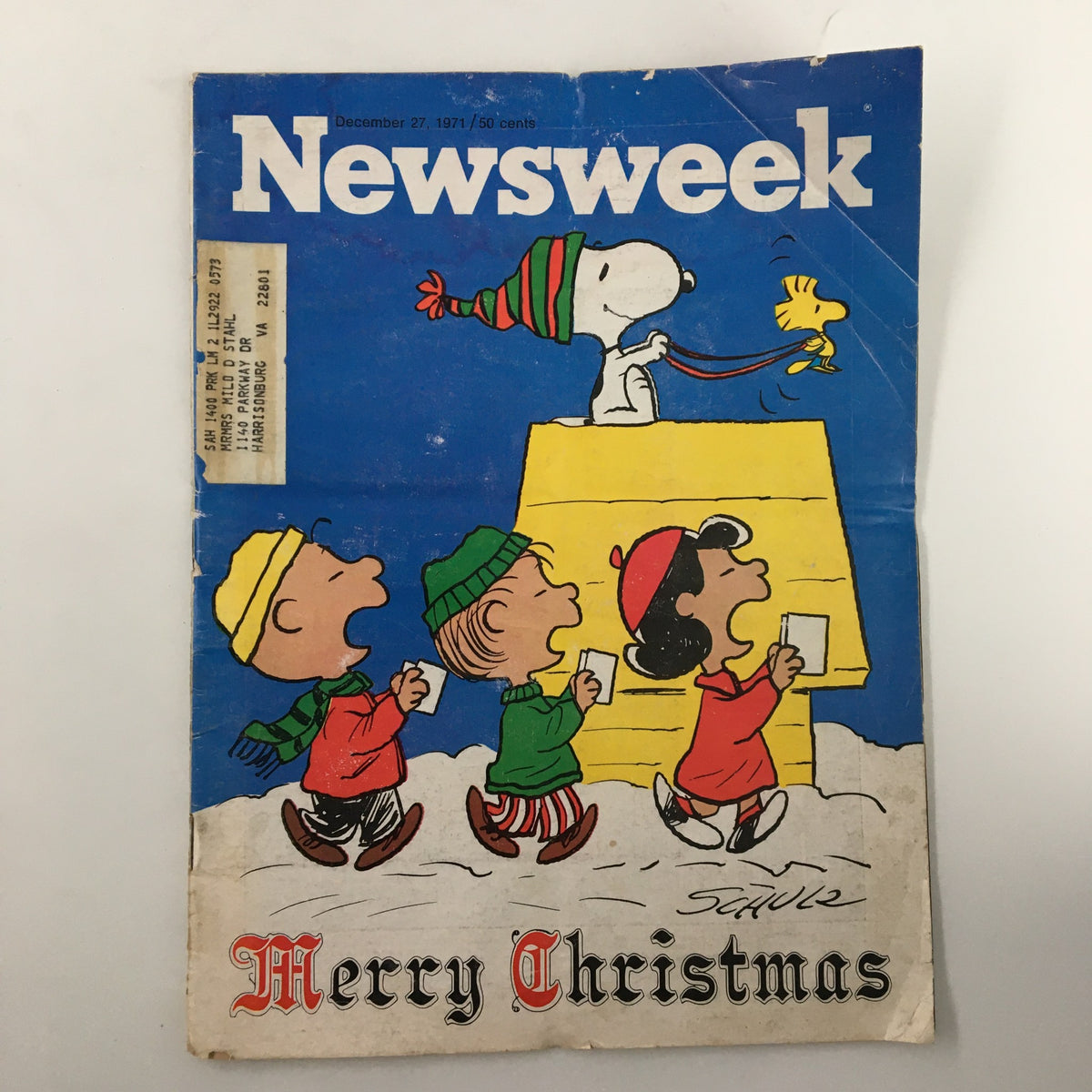 Vintage Newsweek magazine December 27, 1971 featuring Snoopy and friends with a Merry Christmas theme, showcasing four Peanuts characters in winter clothing.