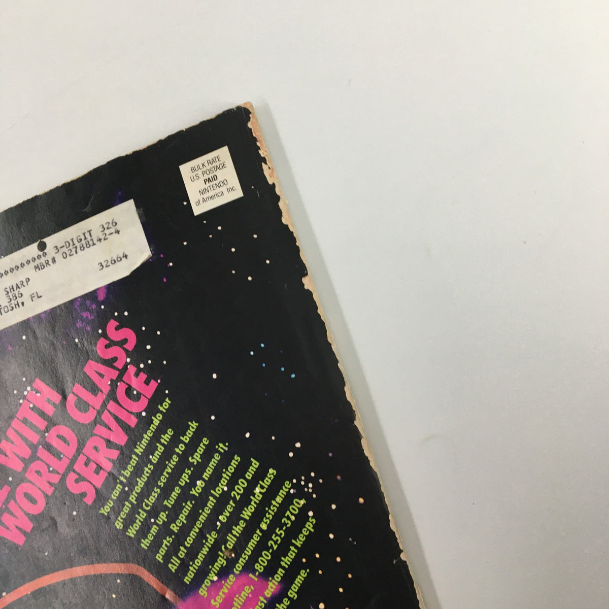Close-up of the back cover of Nintendo Power Magazine February 1991 #21, featuring an address label and details about Nintendo World Class Service.