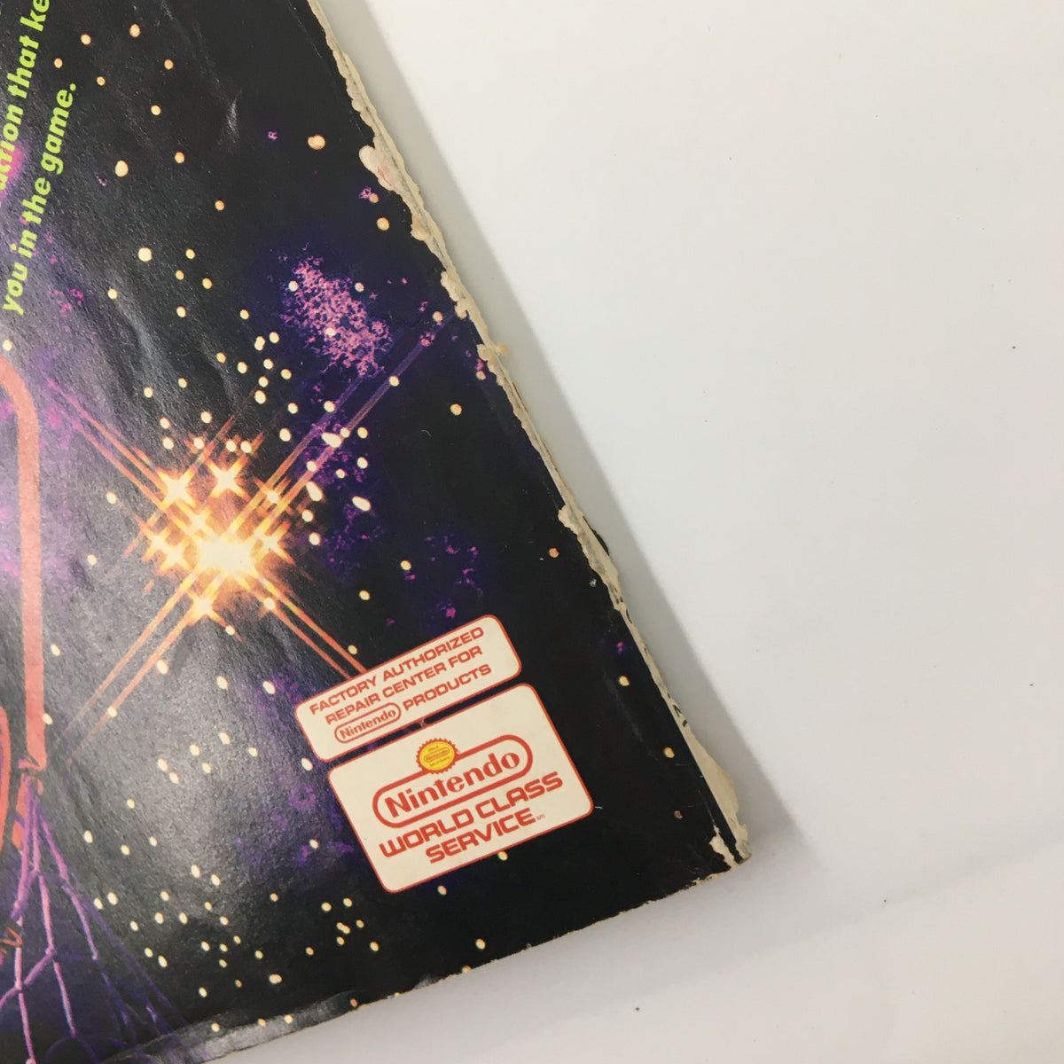 Detailed view of the back cover of Nintendo Power Magazine February 1991 #21, highlighting the vintage condition and Nintendo World Class Service logos.