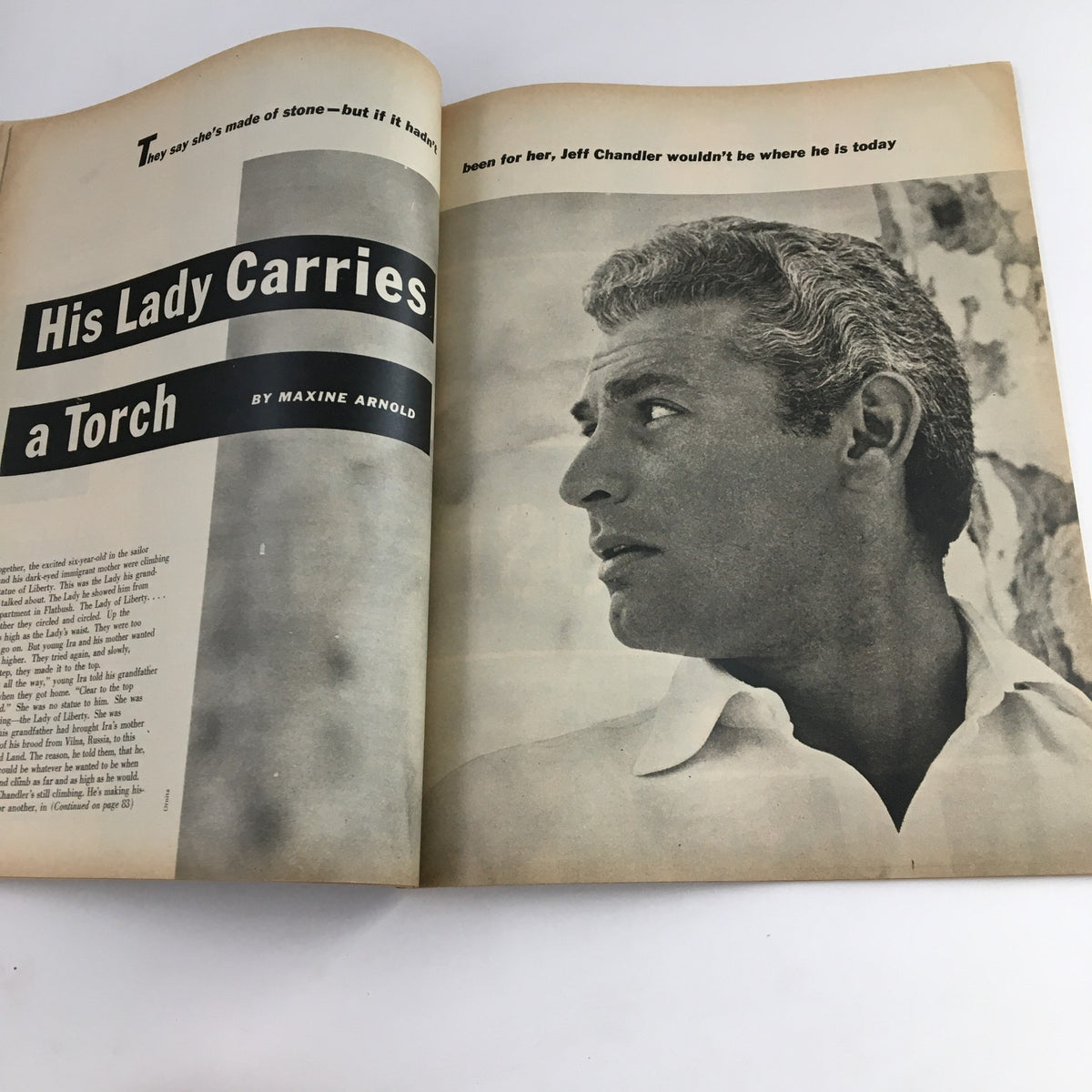Interior spread from Photoplay Magazine August 1953 titled 'His Lady Carries a Torch' highlighting actor Jeff Chandler with an engaging article about his career.