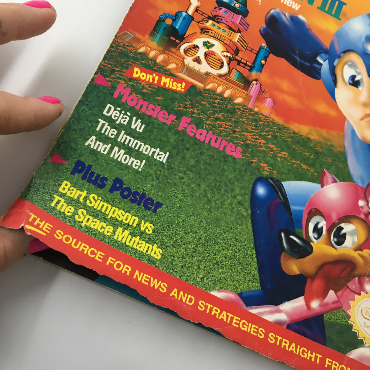 Close-up of the highlighted features section on the cover of Nintendo Power Magazine January 1991, Issue #20, featuring tips on Mega Man III and including a poster offer.