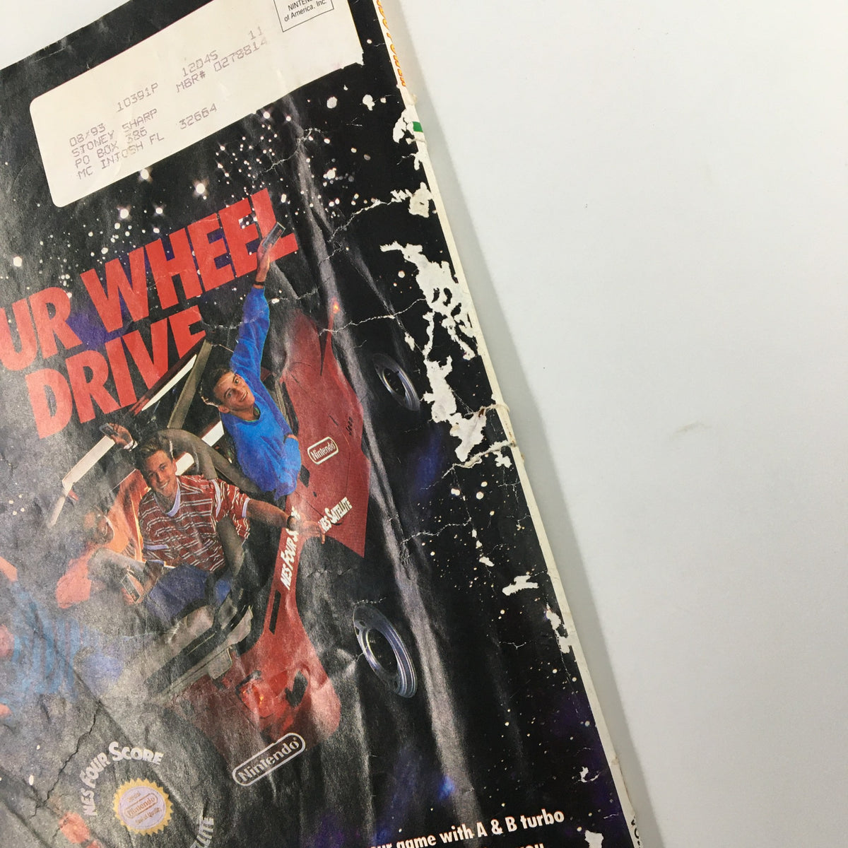 Close-up of the back cover of Nintendo Power Magazine November 1990 #18 highlighting the nostalgic design and wear typical for vintage issues.