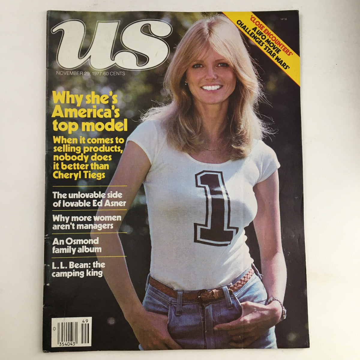 US Magazine cover from November 29, 1977, featuring Cheryl Tiegs as America’s top model, along with mentions of Ed Asner, an Osmond family album, and L.L. Bean.
