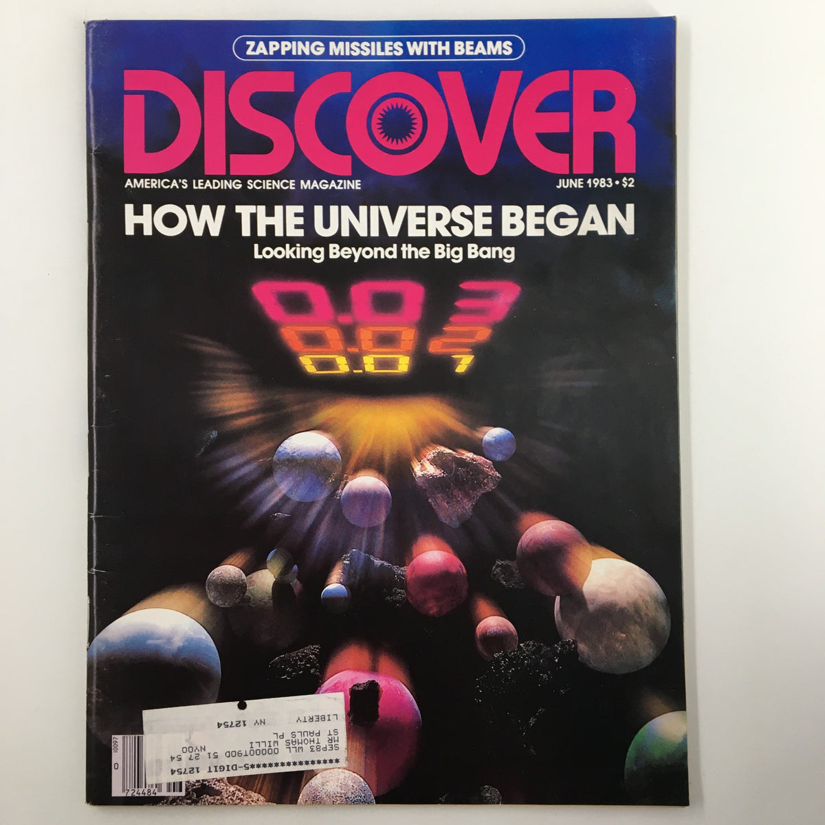 Discover Magazine June 1983 cover featuring the title 'How The Universe Began: Looking Beyond the Big Bang', with a colorful cosmic illustration depicting celestial bodies and scientific themes.