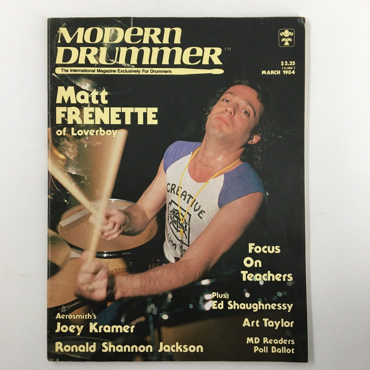Cover of Modern Drummer Magazine March 1984 featuring Matt Frenette of Loverboy, showcasing drumming performance and vibrant design.