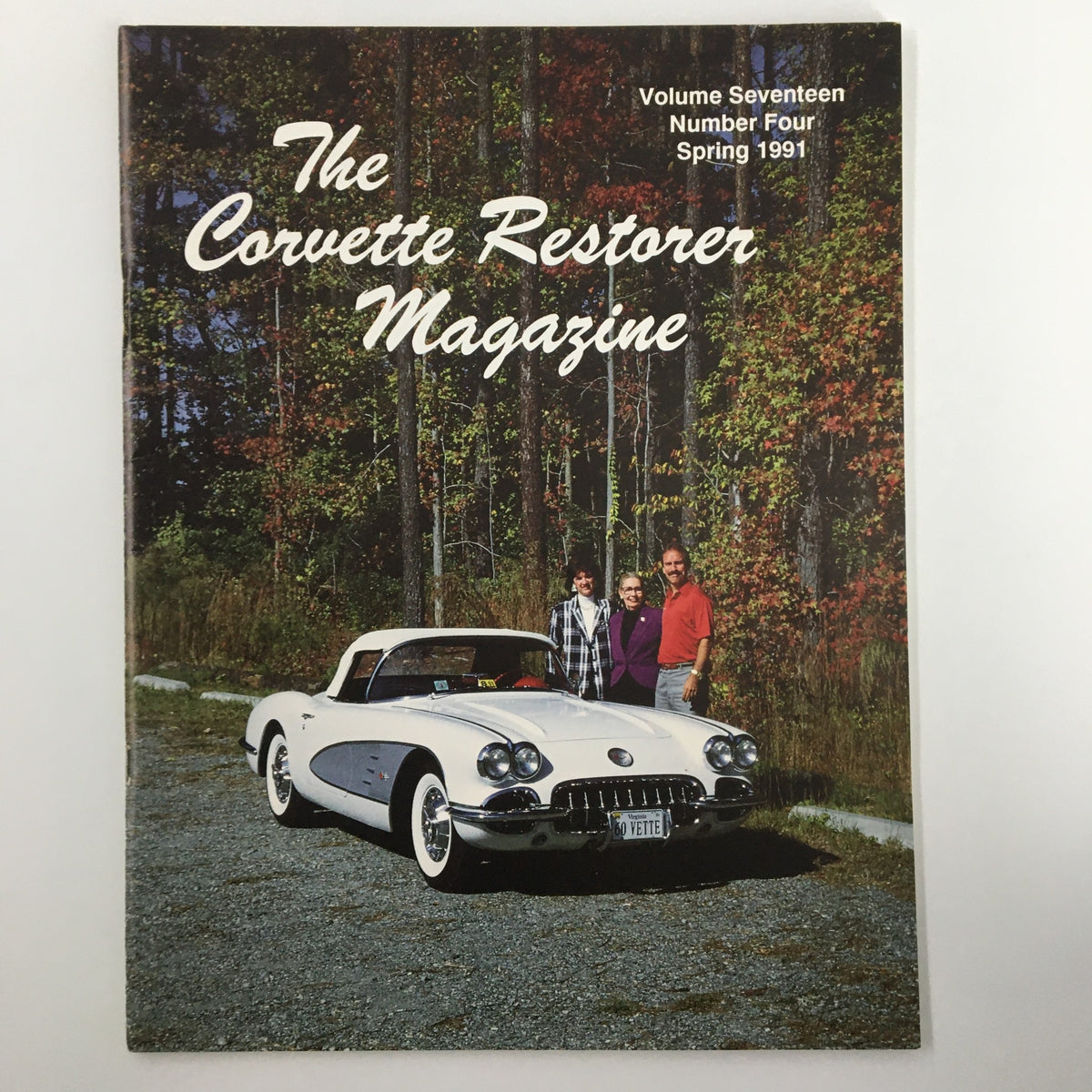 Cover of The Corvette Restorer Magazine Spring 1991 featuring a classic white Corvette and three individuals in a forested setting. Volume Seventeen Number Four edition highlighting the theme 'The Road to Duntov.'