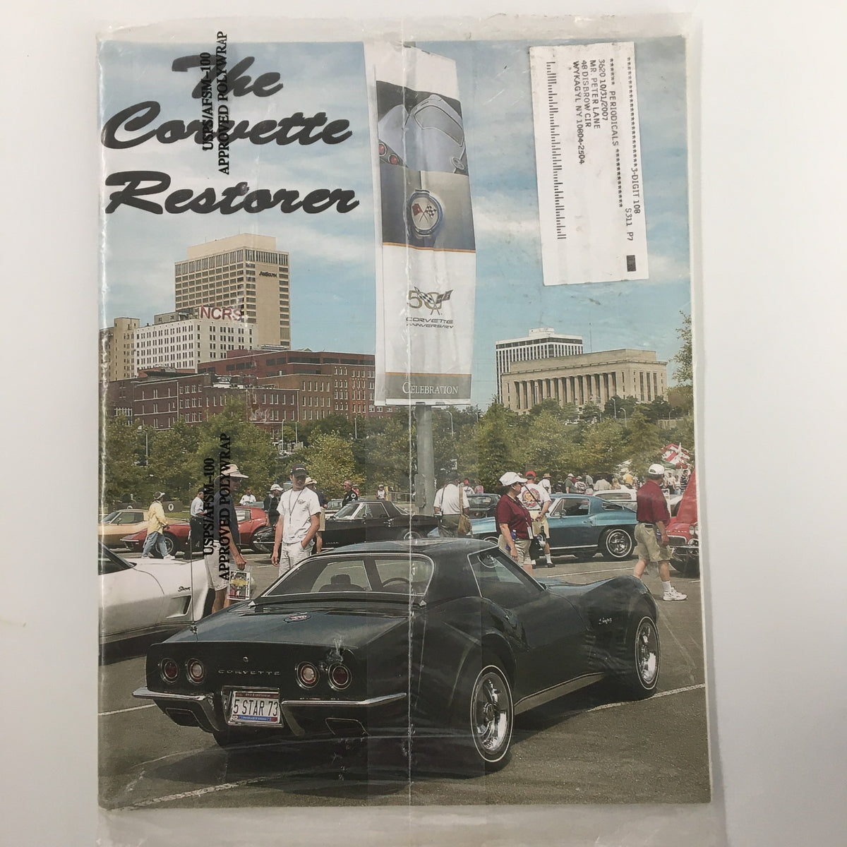 Cover of The Corvette Restorer Magazine Fall 2003 Vol. 30 #2 showcasing a black Corvette in a classic car show setting with a city skyline in the background.