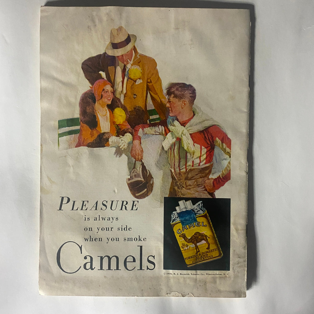 Cover of the October 1930 edition of The American Legion Magazine featuring a vintage advertisement for Camels cigarettes with a group of elegantly dressed people.