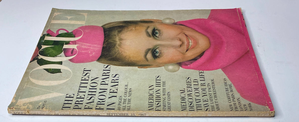 Vogue Magazine September 15, 1967 cover featuring model Heidi Weideck in a pink outfit with a high pouf hairstyle, showcasing iconic fashion from the 1960s by Oscar de la Renta.