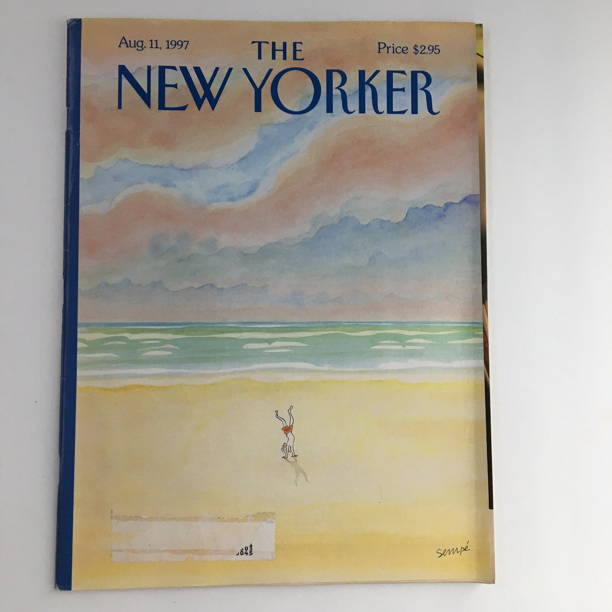 Cover of The New Yorker Magazine August 11 1997 featuring artwork by Jean-Jacques Sempé, depicting a whimsical beach scene with a figure doing a handstand.