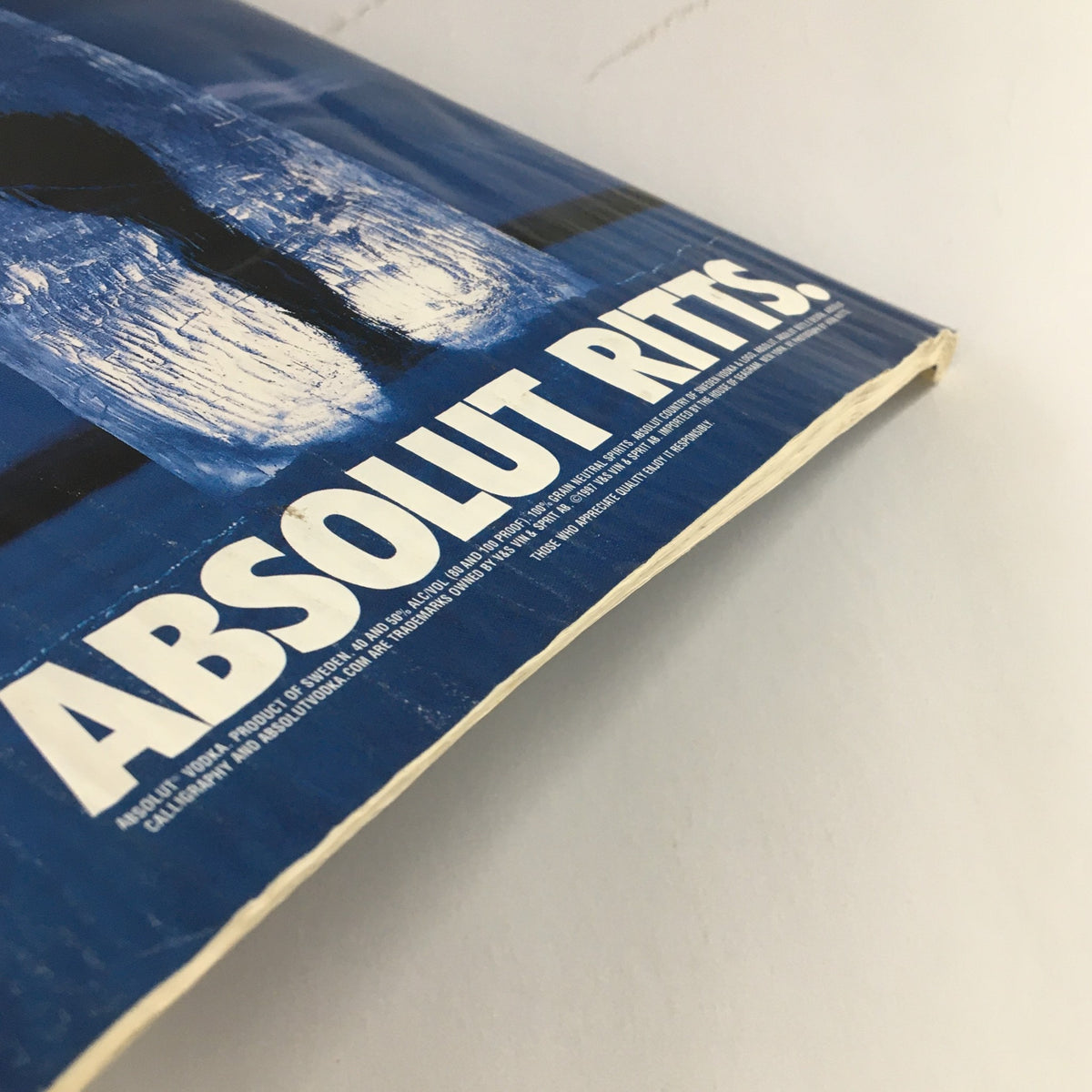 Side view of The New Yorker Magazine May 26 1997, showcasing the spine and edge with a glimpse of an Absolut advertisement.