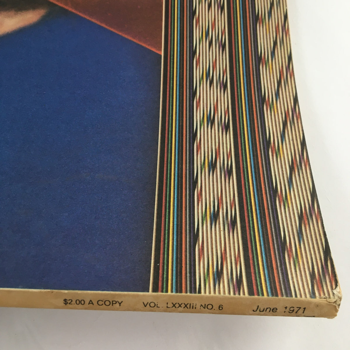 Detailed view of the edge of the Fortune Magazine June 1971 showing the magazine price and volume number.