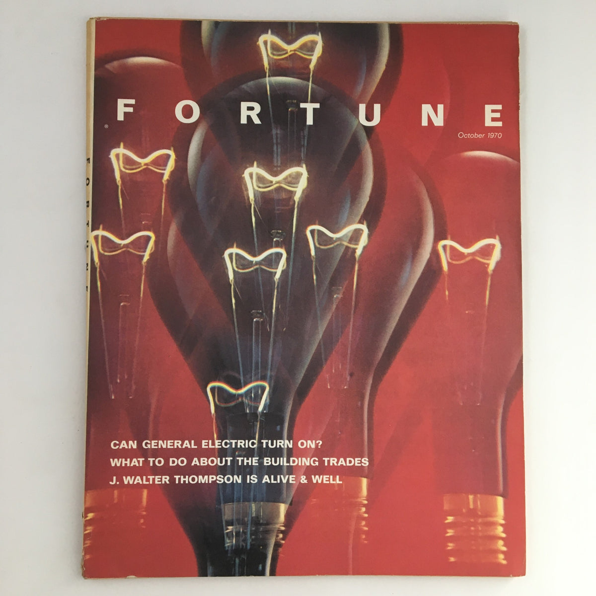 Fortune Magazine cover from October 1970 featuring the title 'J. Walter Thompson is Alive and Well', showcasing a striking design with lightbulbs and bold text.