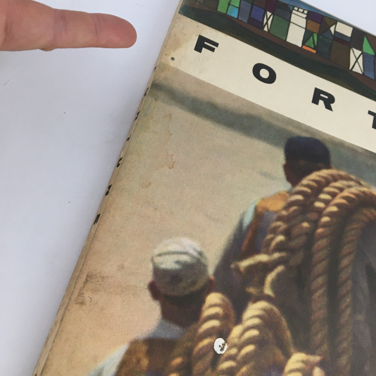 Close-up view of the cover of Fortune Magazine March 1960, highlighting the title and artwork illustrating figures with ropes.