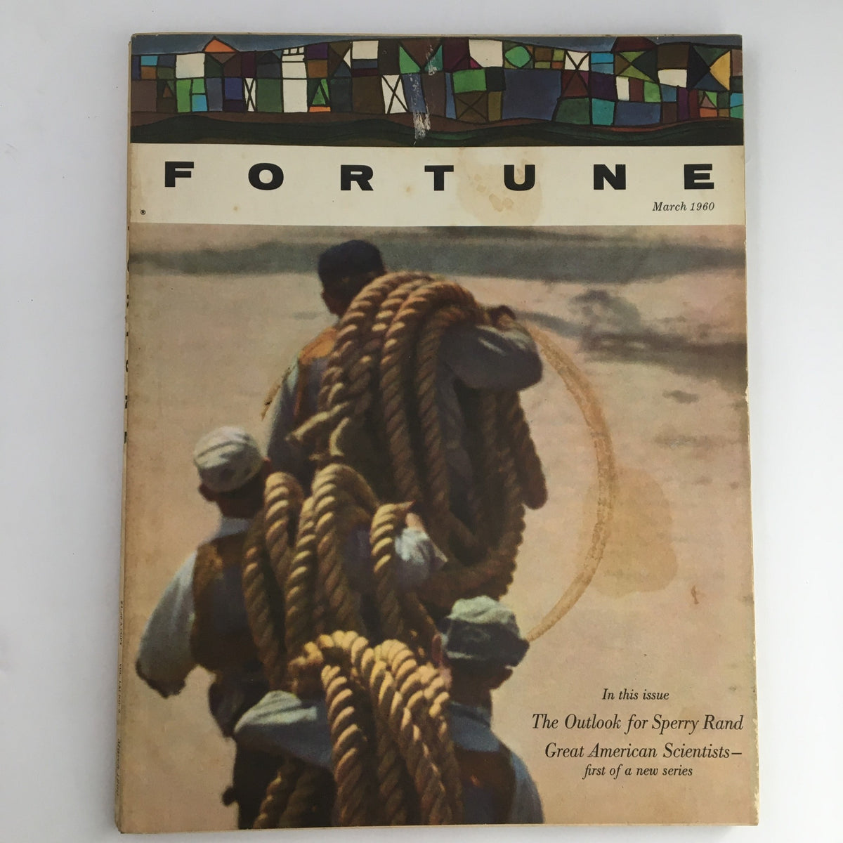 Cover of Fortune Magazine, March 1960, featuring an artistic depiction of individuals with ropes and vibrant design elements, highlighting George T. Baker's Feud with the World.