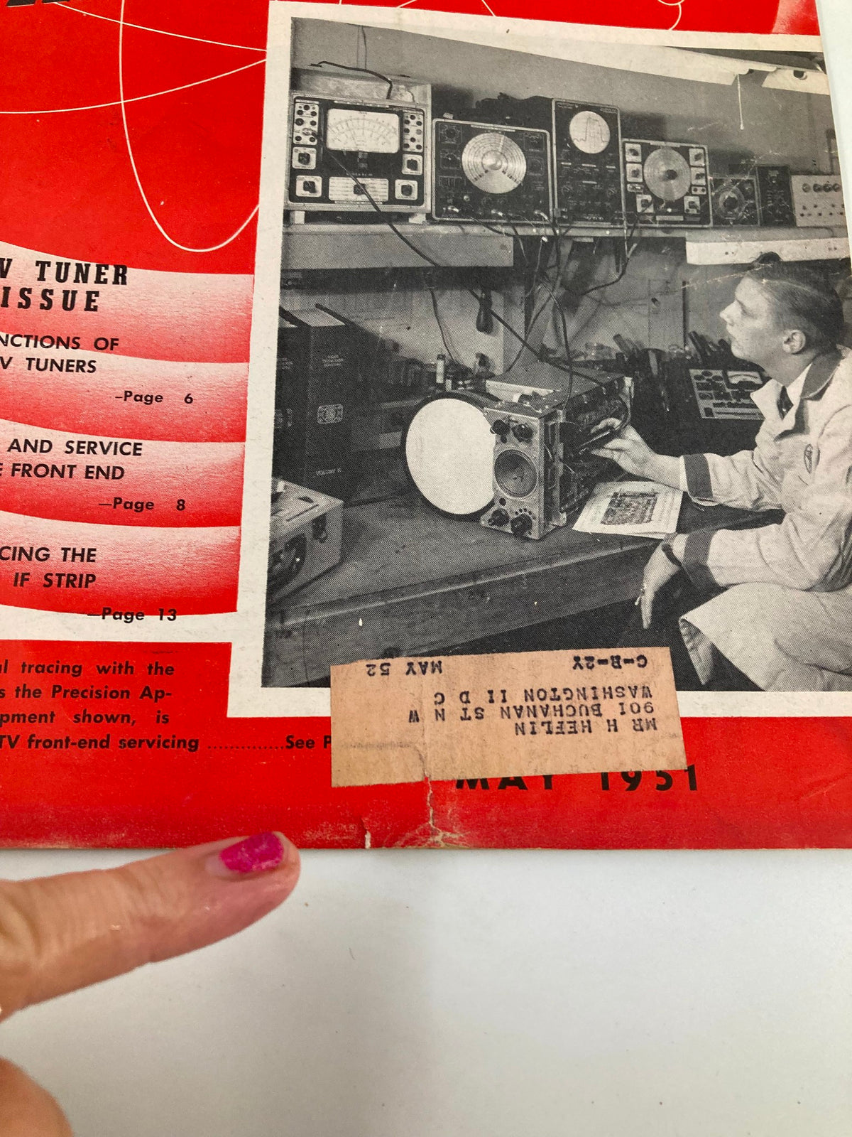 Detailed look at the cover of VTG Radio and Television Maintenance Magazine May 1951, emphasizing the 'Functions of TV Tuners' text and the vintage photo of a technician at work.