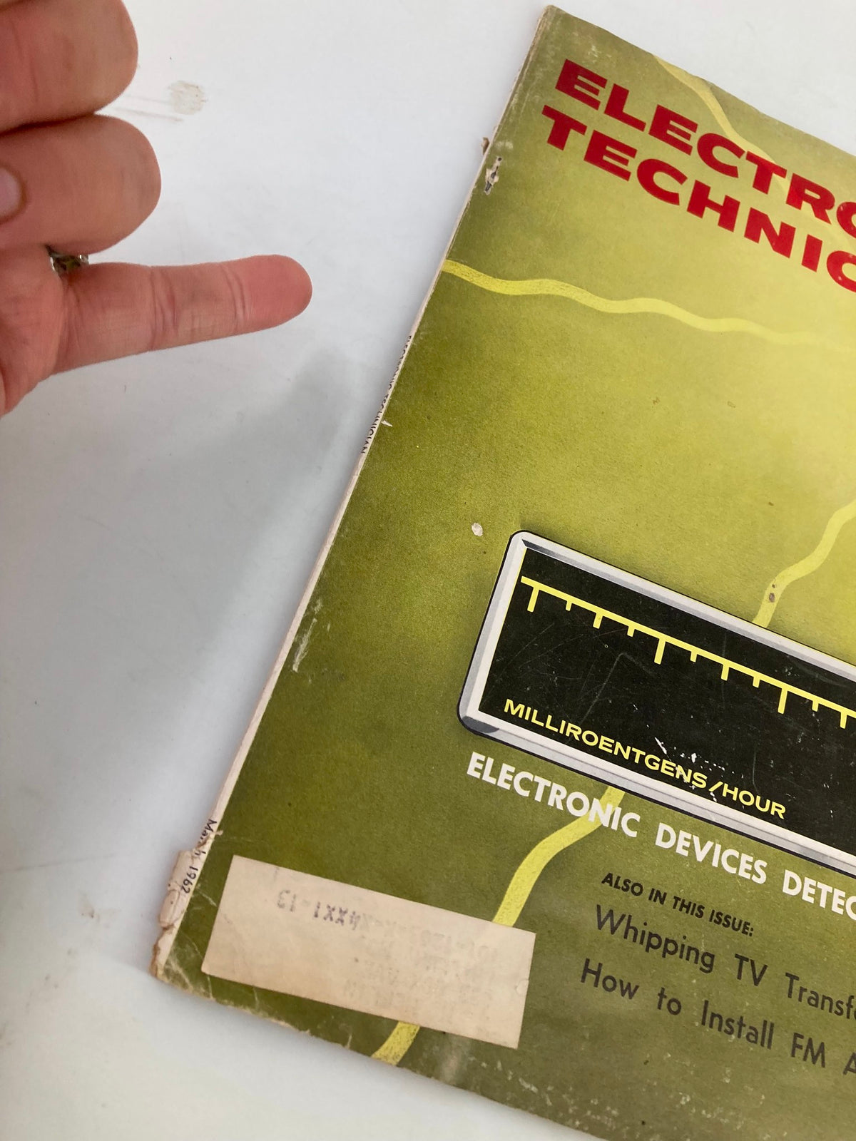 Cover of VTG Electronic Technician Magazine March 1962 showcasing electronic devices detecting radiation with visible wear and a label on the front.