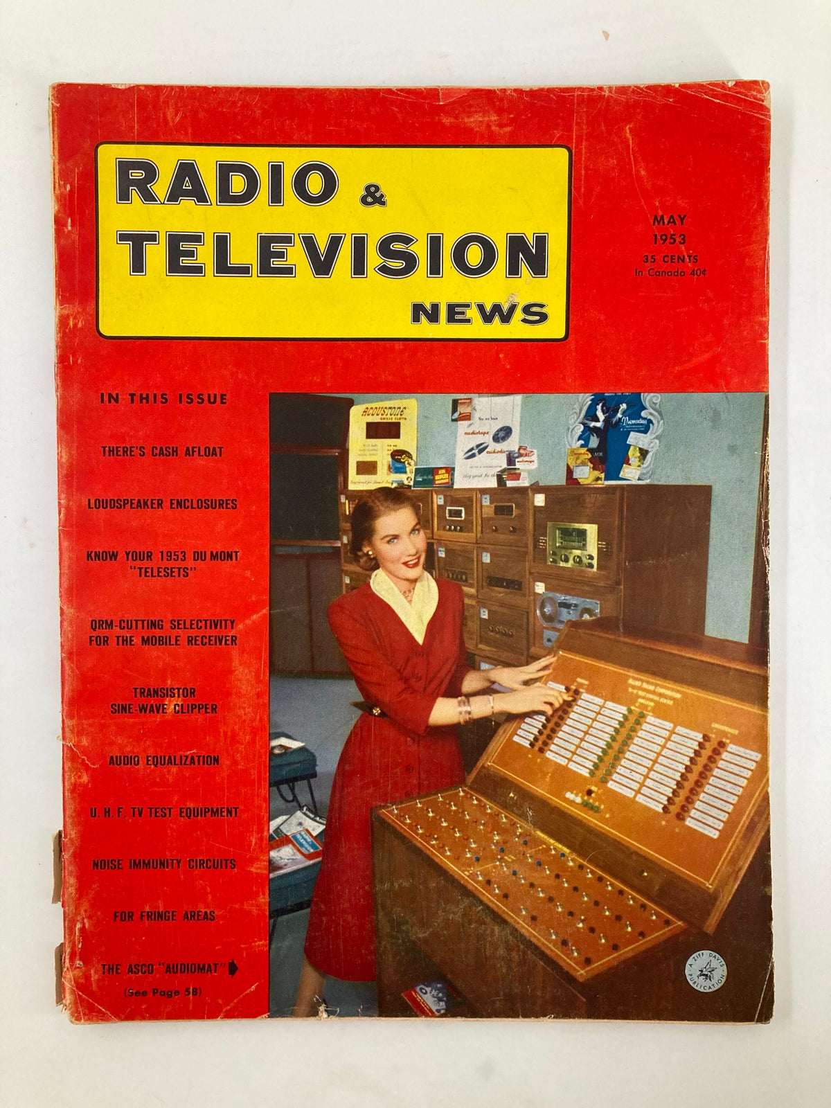 Cover of Vintage Radio and Television News from May 1953 featuring the Asco 'Audiomat' and audio equalization technology, with a woman in a red dress operating a vintage audio device.