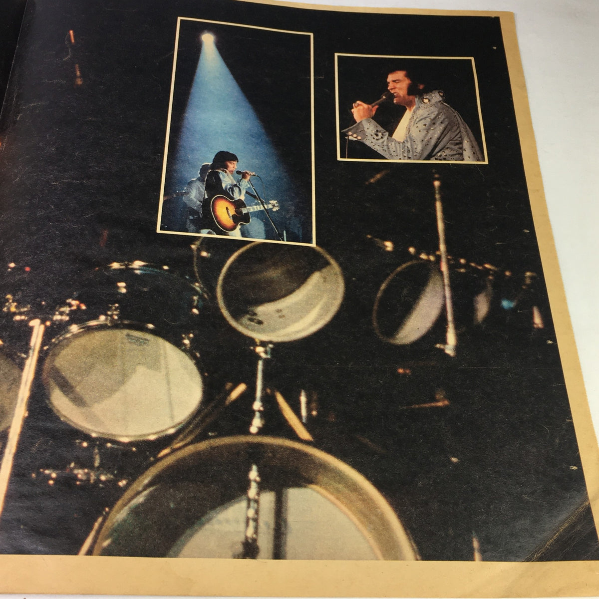 Another performance image from VTG The Courier Journal Magazine August 22 1977, displaying Elvis Presley on stage with musical instruments visible.