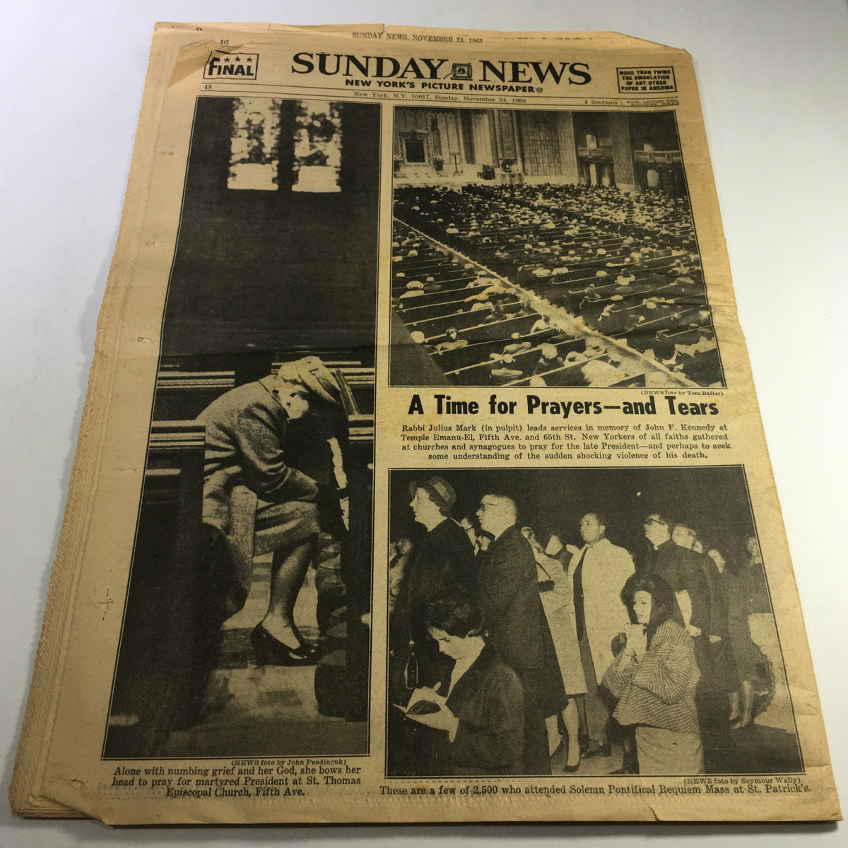 Vintage Sunday News Newspaper from November 24, 1963, featuring President Lyndon Johnson leading the nation in mourning for John F. Kennedy. The front page shows emotional scenes of grief and tributes, capturing a significant moment in American history.