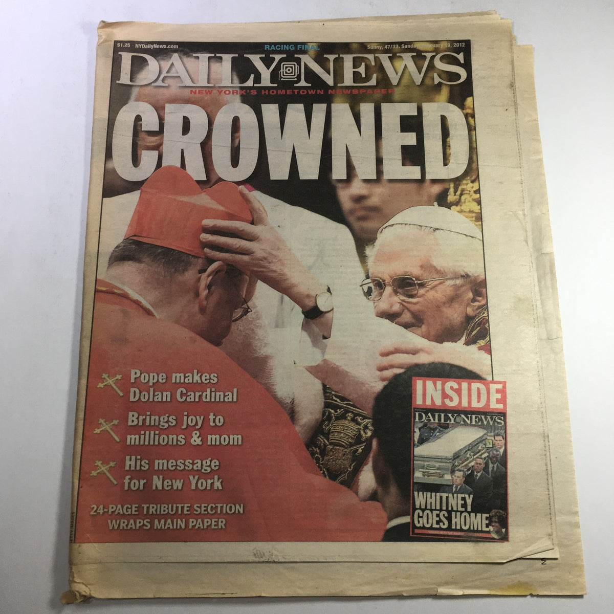 Cover of New York Daily News February 19 2012 - Pope John Paul II / Dolan / Newsstand, featuring the headline 'CROWNED', showcasing Pope making Dolan Cardinal and featuring a 24-page tribute section.