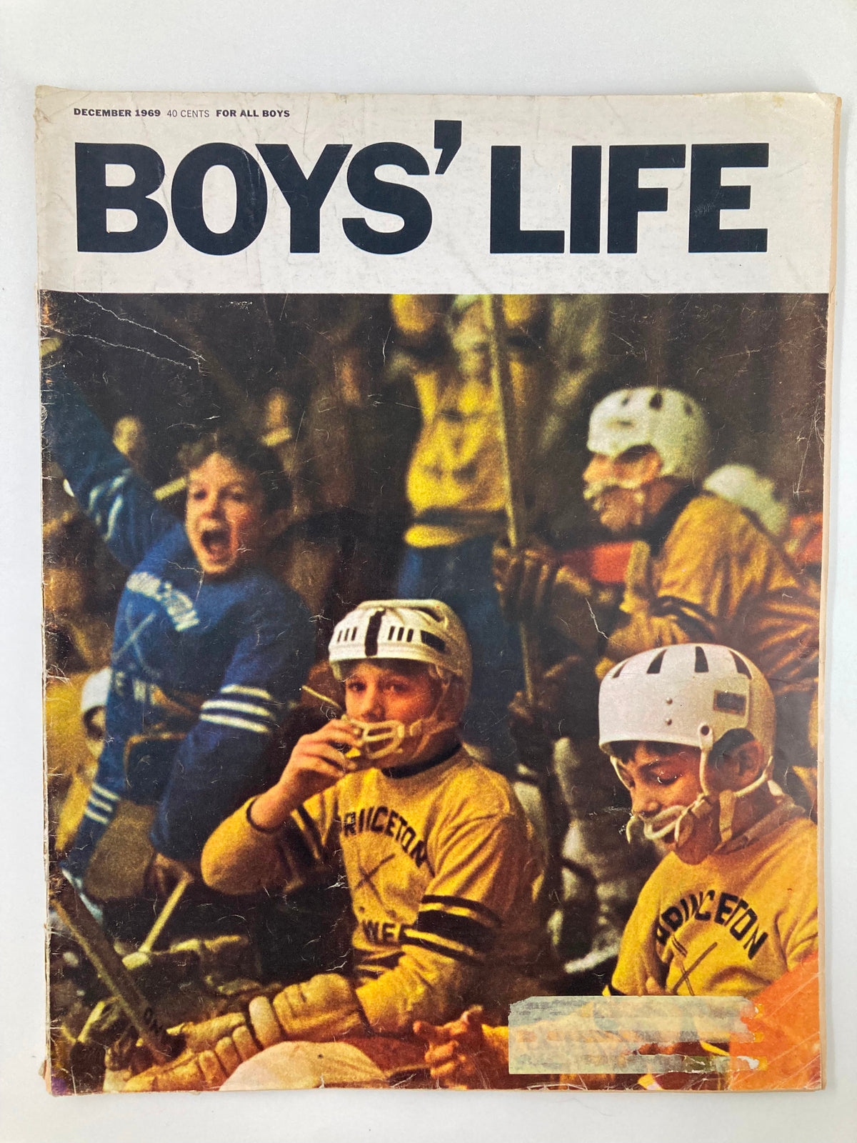 Cover of the December 1969 issue of Boys' Life magazine titled 'Hockey is for Tough Guys Big and Small.' Features young hockey players in team jerseys, capturing the spirit of youth sports in the late 1960s.