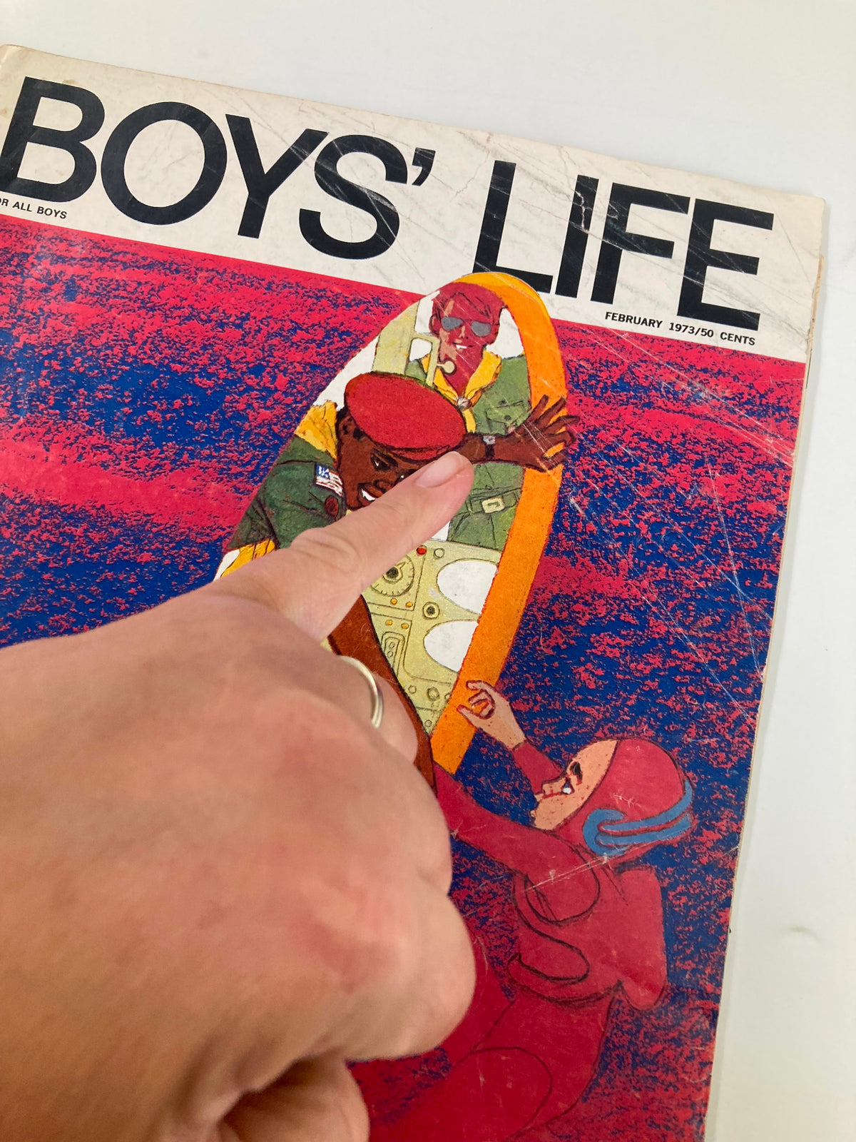 Cover of VTG Boys' Life Magazine February 1973 featuring colorful illustrations of adventure, highlighting the theme 'By The Light of the Midnight Sun'.