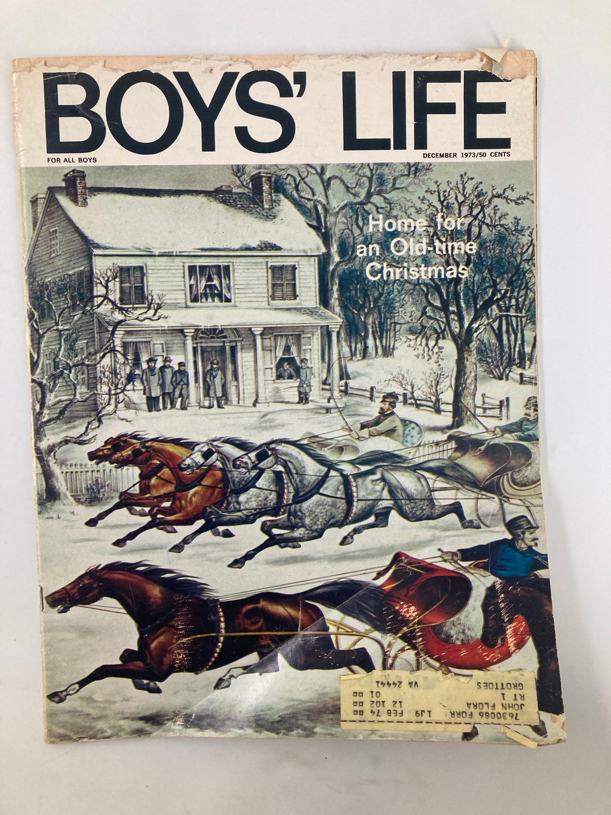 Cover of Boys' Life Magazine, December 1973, titled 'Home For An Old-Time Christmas', featuring a snowy scene with horses pulling a sleigh and a historic house in the background.