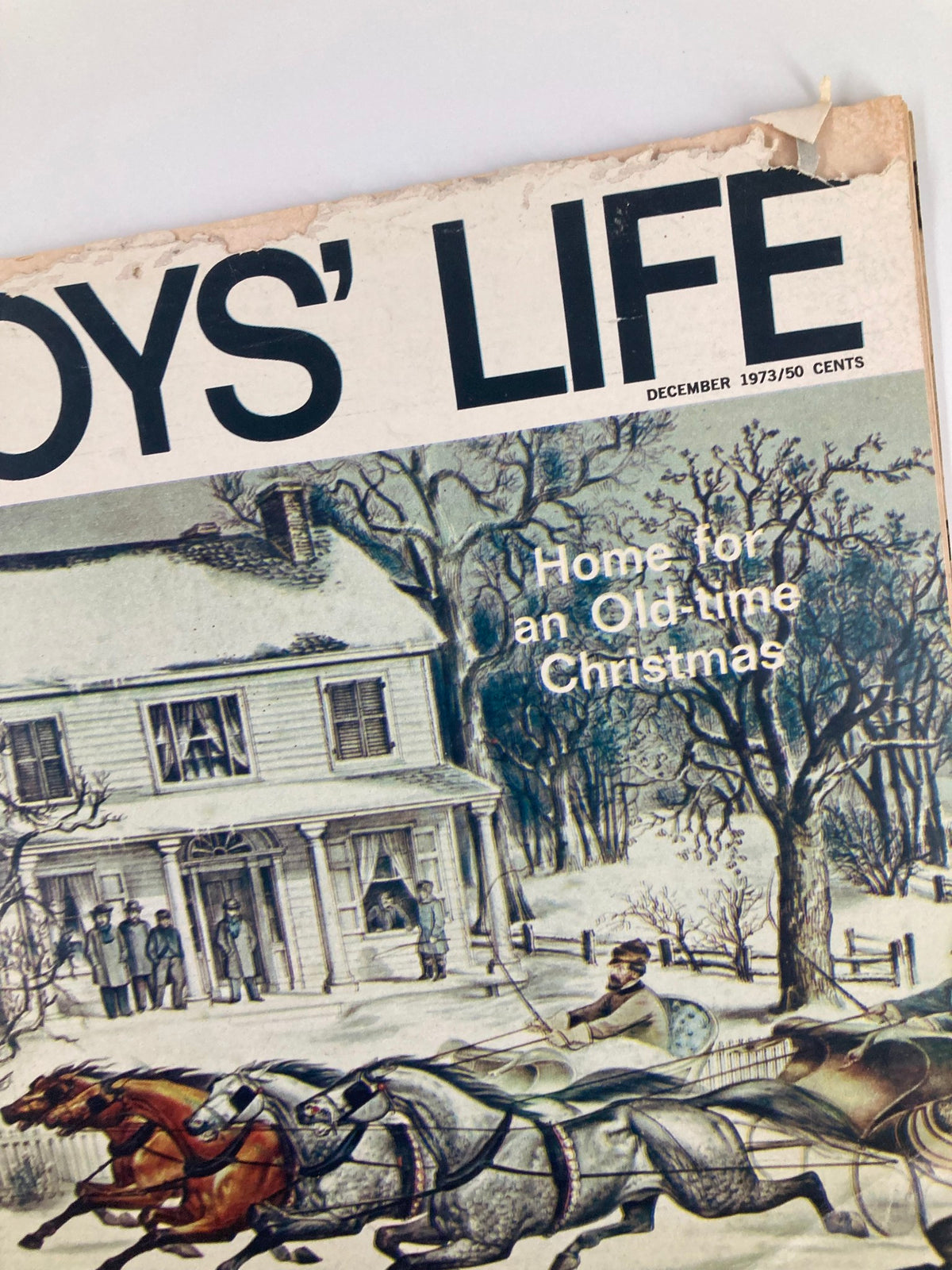 Close-up of the cover of Boys' Life Magazine, December 1973, highlighting the title 'Home For An Old-Time Christmas' and the vintage winter illustration.