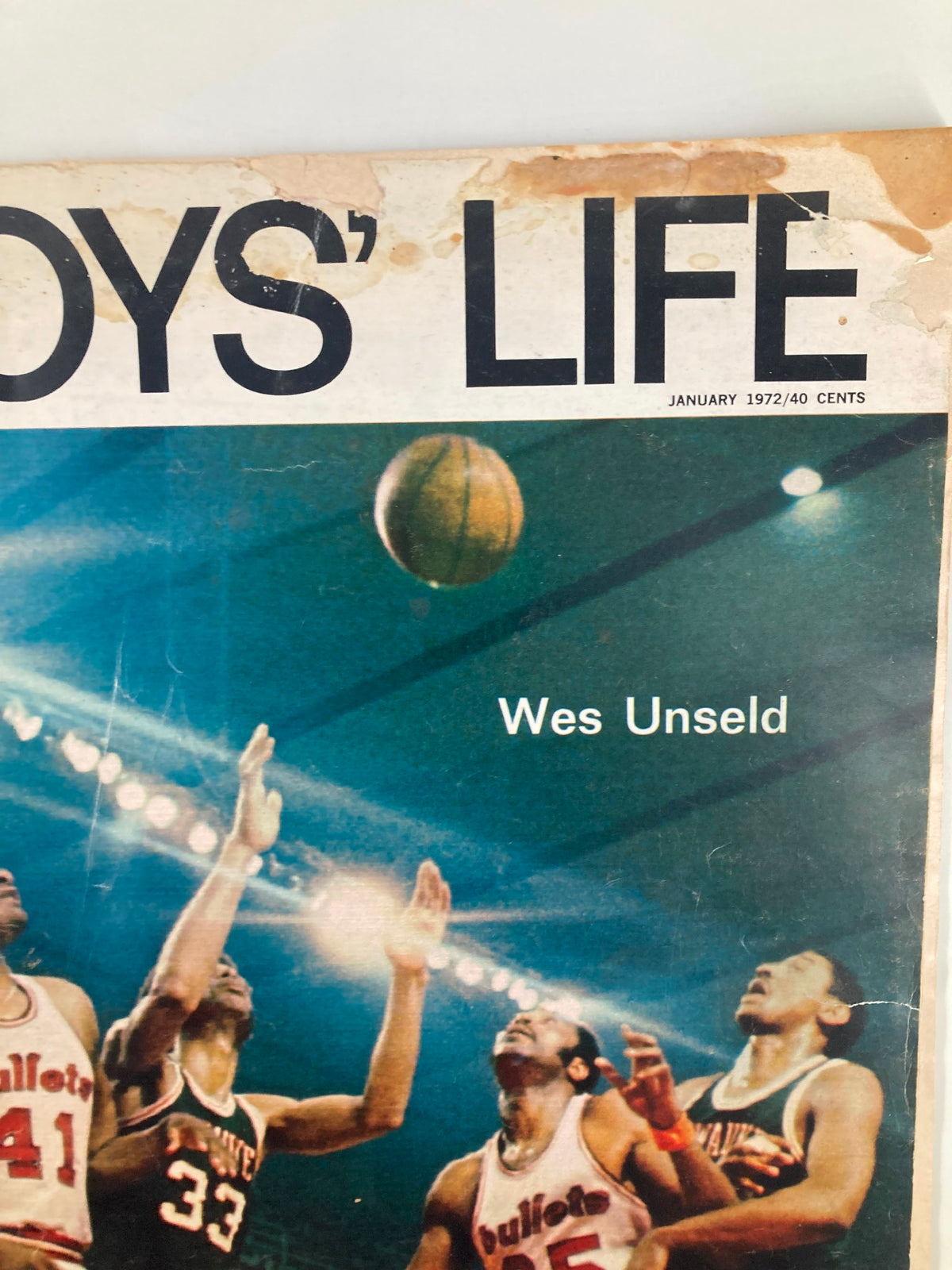 Close-up of VTG Boys' Life Magazine January 1972 cover showcasing Wes Unseld and basketball players.