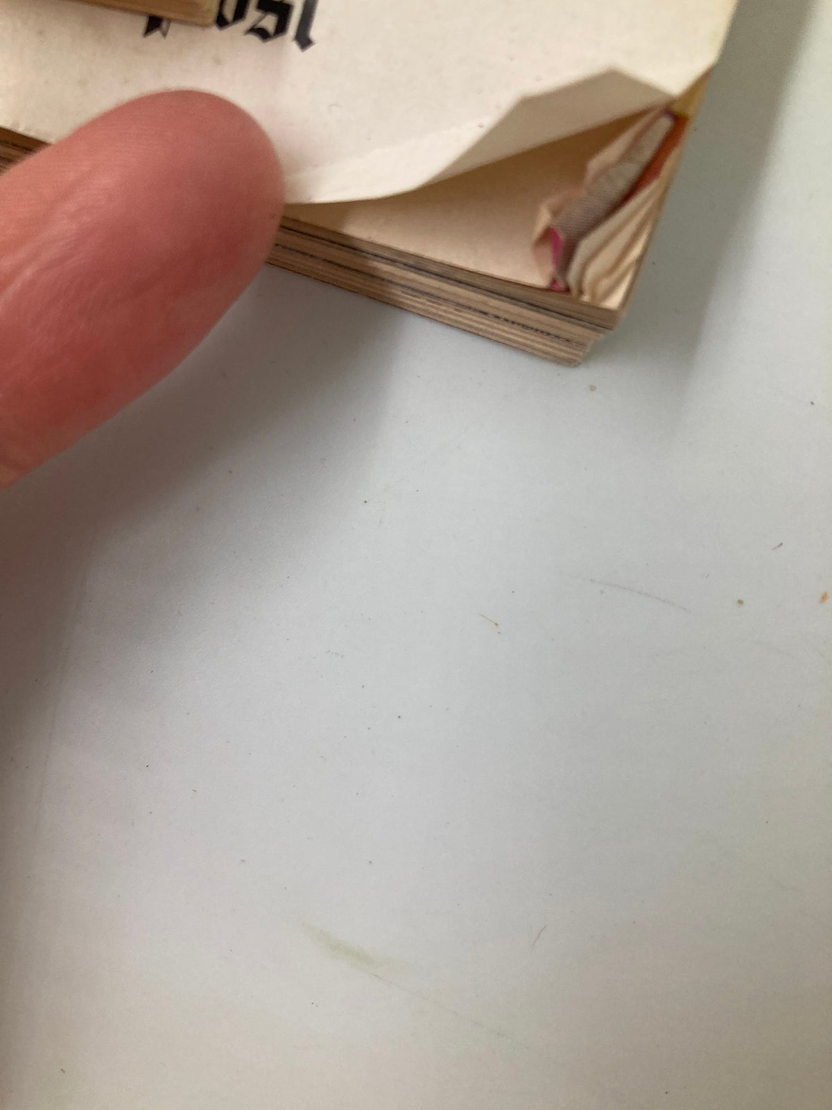 Image of the spine of the Vintage The Washington Post Magazine July 4 1976, featuring a finger pointing at a folded corner, indicating the magazine’s vintage condition.