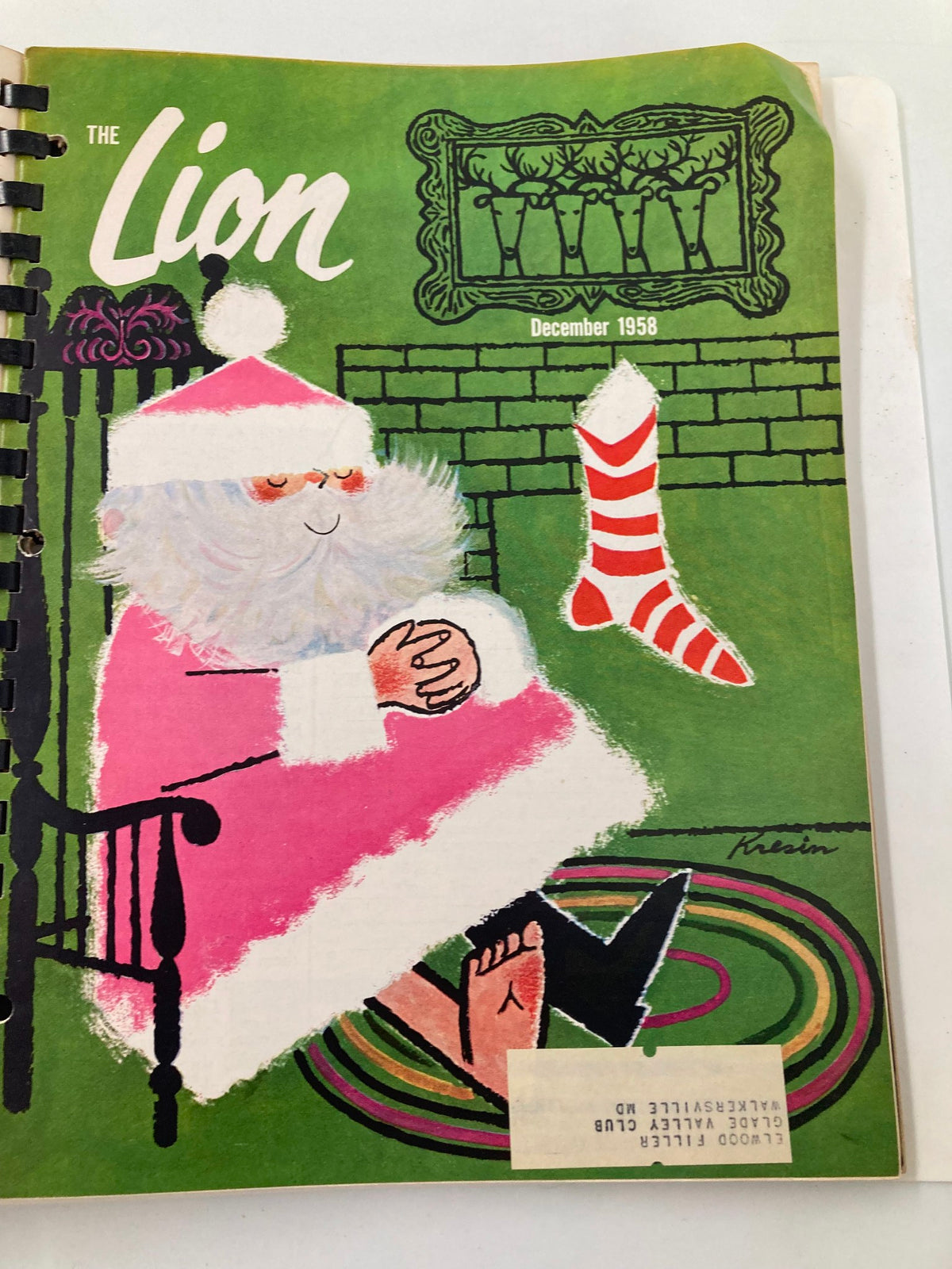 Cover of The Lion magazine, December 1958 edition, depicting a whimsical Santa Claus illustration in festive colors, perfect for the holiday season.