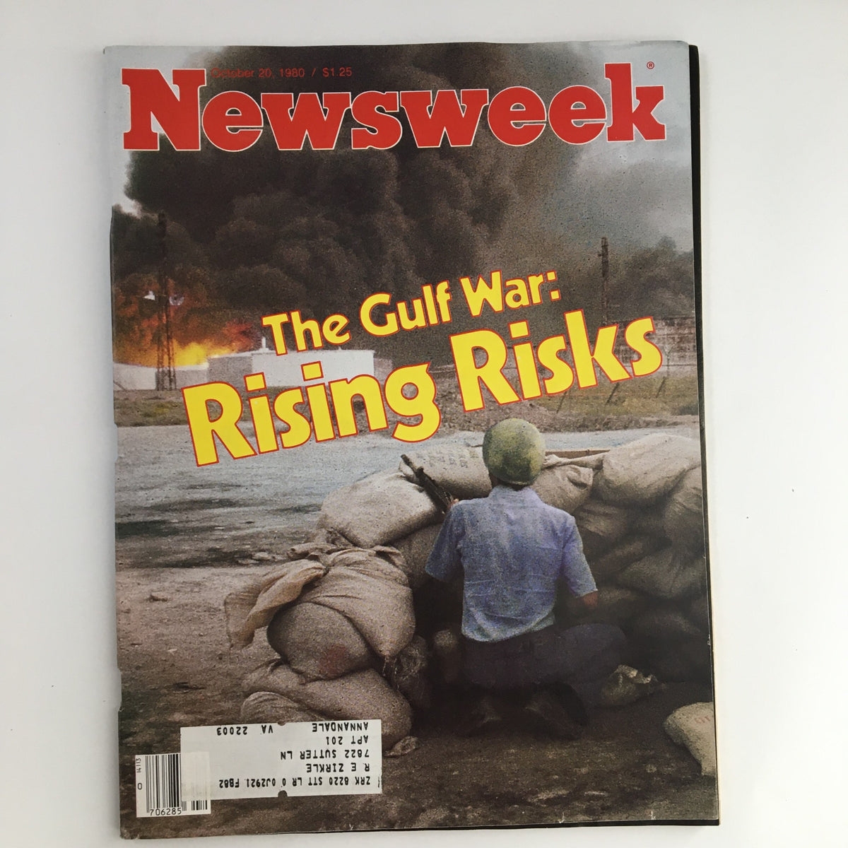 Cover of Newsweek Magazine from October 20, 1980, titled 'The Gulf War: Rising Risks', featuring a person looking at sandbags with smoke in the background, illustrating the geopolitical tensions of the era.