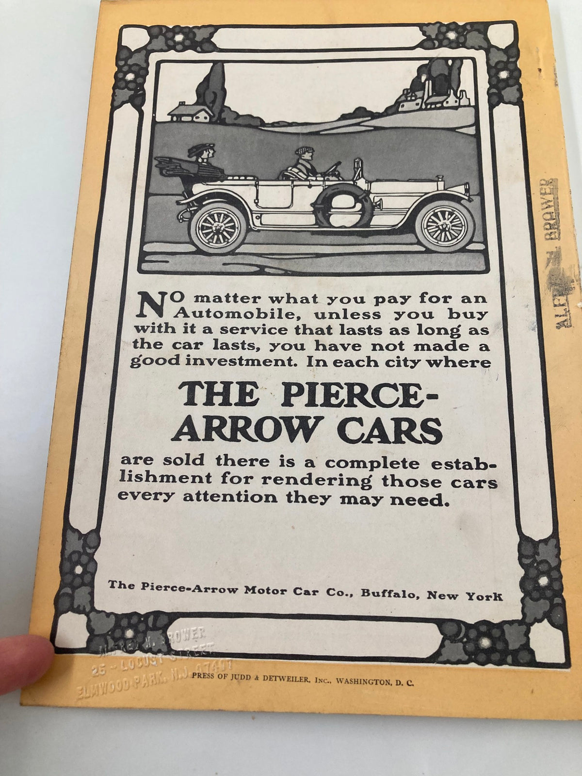 Back cover of the July 1913 National Geographic Magazine advertising Pierce-Arrow cars, highlighting their investment value and services across U.S. cities.