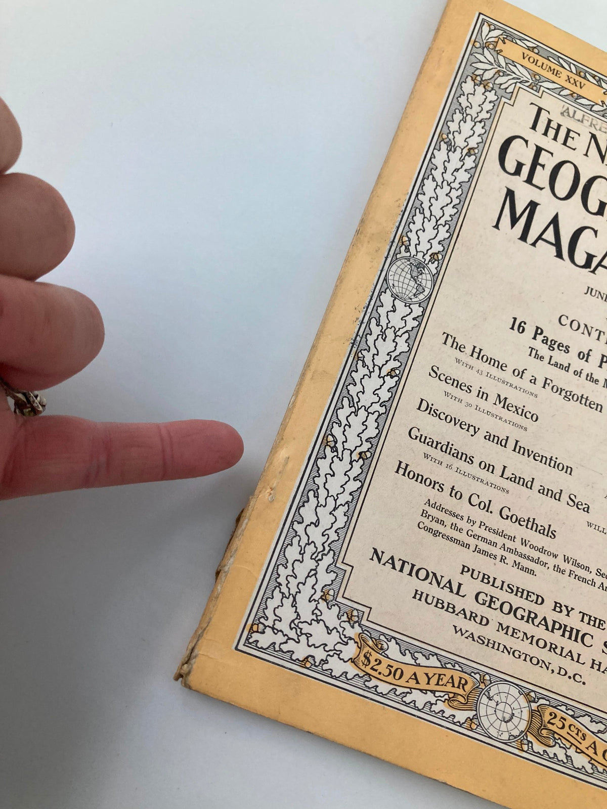 Side view of The National Geographic Magazine from June 1914, highlighting minor wear and the spine of the magazine.
