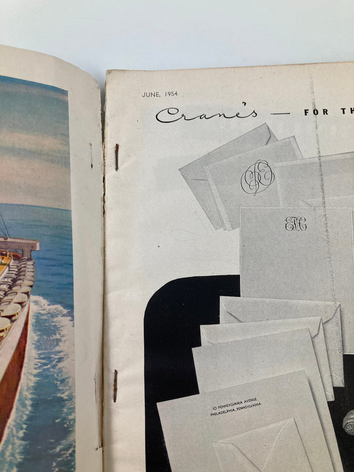 Inside page of VTG House & Garden Magazine June 1954, featuring an advertisement or section related to stationery, with the magazine's publication date prominently displayed.