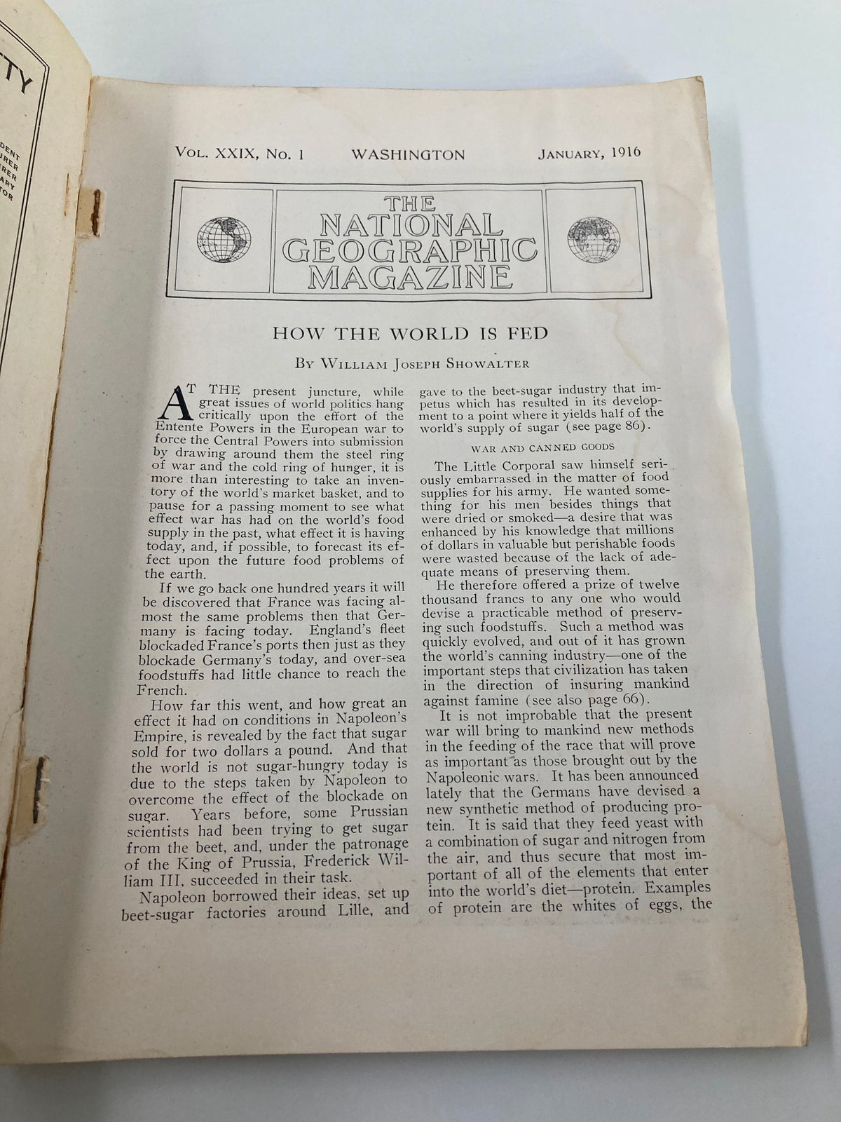 Interior page of the January 1916 National Geographic Magazine featuring the article 'How The World is Fed' by William Joseph Showalter, detailing food supply and production.